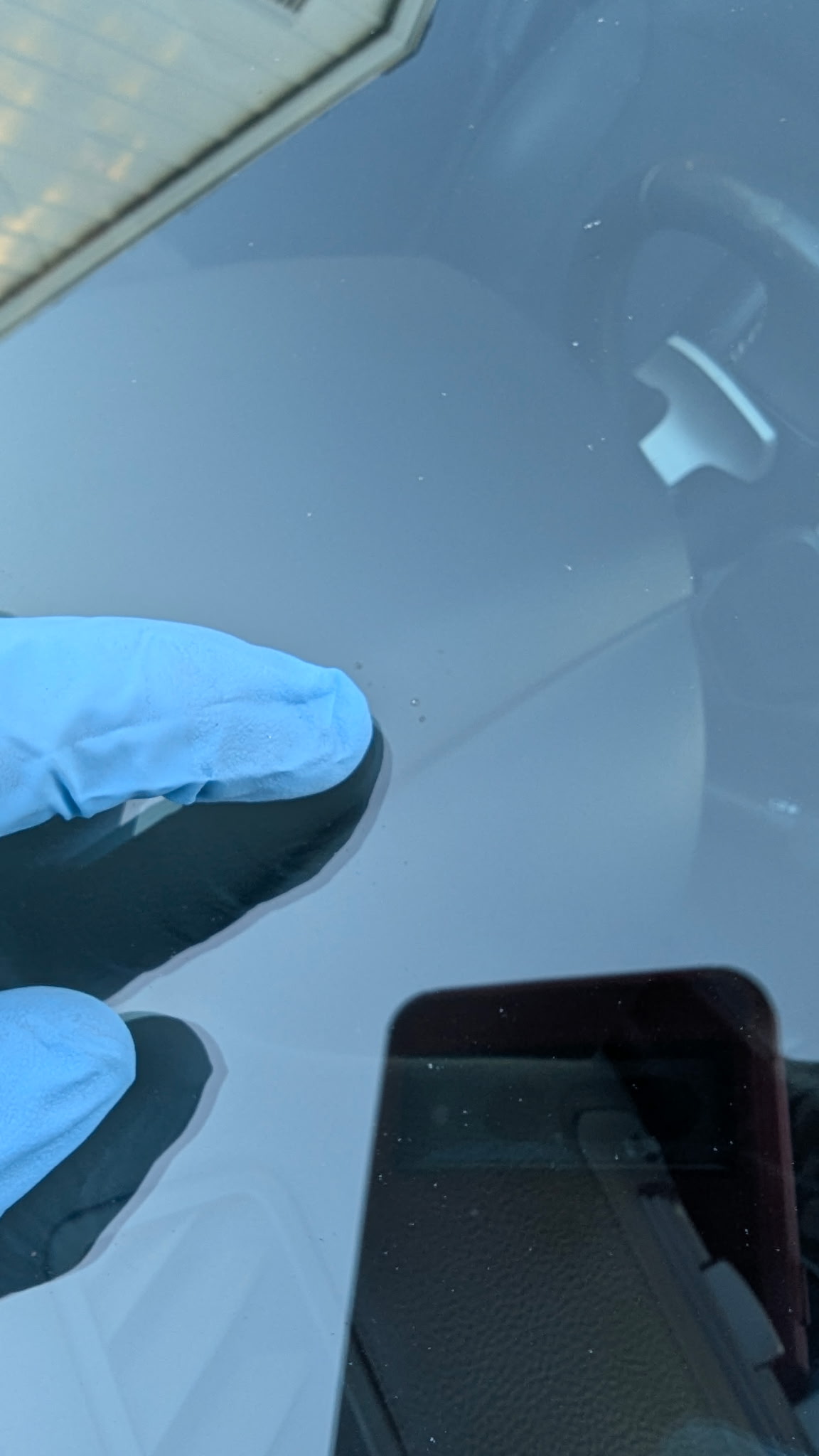Completed windshield rock chip repair